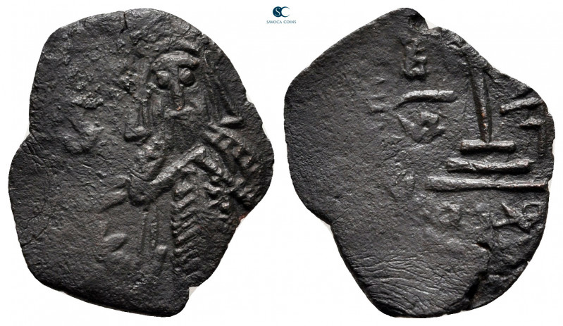 Umayyad Caliphate. Time of 'Abd al-Malik ibn Marwan AH 65-86. 
Fals Æ

20 mm,...