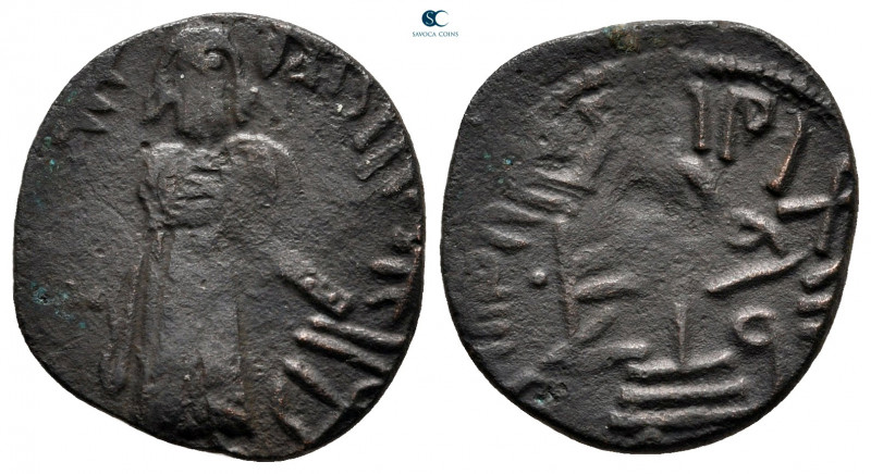 Umayyad Caliphate. Time of 'Abd al-Malik ibn Marwan AH 65-86. 
Fals Æ

19 mm,...