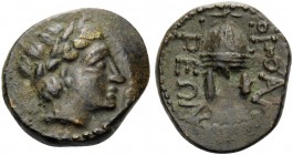 MACEDON. Orthagoreia . Circa 350 BC. Dichalkon (Bronze, 14 mm, 2.36 g, 4 h). Laureate head of Apollo right. Rev. Macedonian helmet surmounted by a sta...