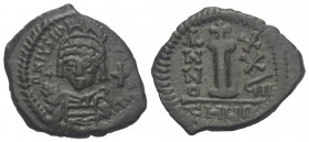 Iustinianus I. (527 - 565 n. Chr.).

 Dekanummion. Jahr 27. Anchiochia (Theoupolis).
Vs: Legende verwildert. Büste des Kaisers mit Panzer, Paludame...