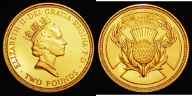 Two Pounds 1986 Commonwealth Games - Scottish Thistle S.K1 Gold Proof FDC uncased in the original plastic capsule, the capsule a little stained the co...