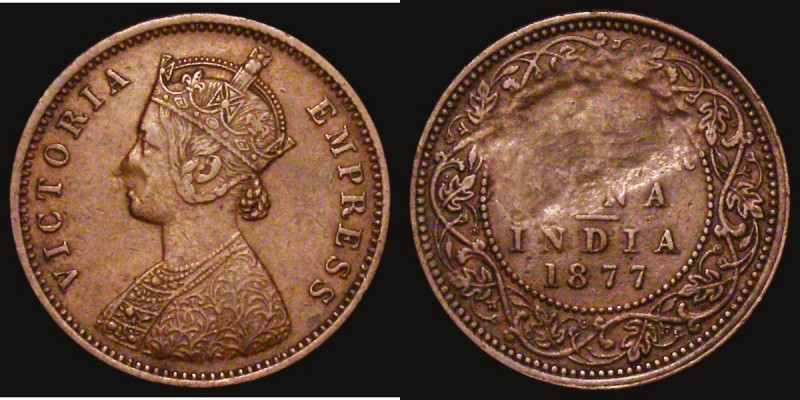 Mint Error - India Quarter Anna 1877 a 'strike through' error, the reverse with ...