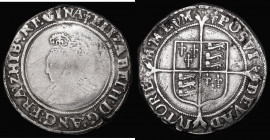 Shilling Elizabeth I First Issue S.2548/2549 mintmark Lis Obverse: the bust details worn, the legend Fine, Reverse Fine with some pitting

 Estimate...
