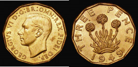 Brass Threepence 1949 Peck 2392 UNC with around 70% lustre, the odd very minor tone spot barely detracts, a superb example of this key date rarity

...
