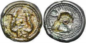 GAULE BELGIQUE, Suessiones, AE potin, avant 52 av. J.-C. D/ Deux boucs affrontés, dressés sur les pattes arrière, de part et d''autre d''un annelet po...