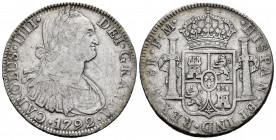 Charles IV (1788-1808). 8 reales. 1792. Mexico. FM. (Cal-954). Ag. 26,58 g. Choice F/Almost VF. Est...40,00. 

Spanish Description: Carlos IV (1788-...