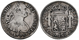 Charles IV (1788-1808). 8 reales. 1795. Mexico. FM. (Cal-958). Ag. 26,72 g. Small chop marks. Punch marks. Almost VF. Est...65,00. 

Spanish Descrip...