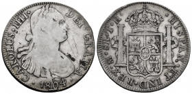 Charles IV (1788-1808). 8 reales. 1804. Mexico. TH. (Cal-980). Ag. 26,67 g. Scratches on obverse. Planchet flaw on obverse. F/Choice F. Est...50,00. ...