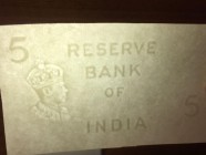 India, 5 Rupees, UNC, Watermark sample
This is an interesting banknote and an interesting article for collectors of King George VI's photographic por...