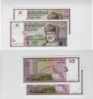 Oman, 1/2 Rial, 1995, UNC, p33, (TWO BANKNOTES)
AH: 1416, Sultan Of Oman Qaboos bin Said Al Said portrait