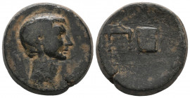 Octavian(?) - Cilicia or Syria - Portrait Bronze Circa 30 BC. Uncertain mint in Cilicia or Syria.

Bare head right, spear, sella quaestoria (seat) a...