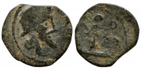 GREEK. Uncertain mint, possibly Mesopotamia. Ae (bronze, 0.51 g, 11 mm). Bearded bust to right. Rev. Tyche (?), holding wreath. Very fine.
