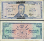 Burundi: 100 Francs 1965 with black overprint P. 17a, used with center fold, light stain in paper, no holes, still strong paper, condition: F+.
 [dif...