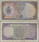 Libya: Bank of Libya ½ Pound 1963, P.24, lightly toned paper with some spots and several folds, Condition: F.
 [zzgl. 19 % MwSt.]