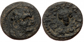 Lydia. Sala (?) AE (Bronze, 1.54g, 14mm) Pseudo-autonomous issue 
Obv: bearded head of Heracles, right.
Rev: (unreadable legend around) bunch of gra...