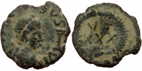 Vandals ?, AE nummus (Bronze, 11,5 mm, 0,64 g), imitation of Justinian I (527-565), Carthago. Obv: […] SVS […]XVII, diademed, draped and cuirassed bus...