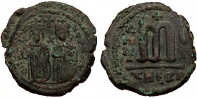 Phocas with Leontia (602 - 610 AD) Ae Follis (bronze, 10,09 g, 28 mm) Theoupolis (Antioch) Obv: O N FOCA NE PE AV, Phocas on left and Leontia on right...