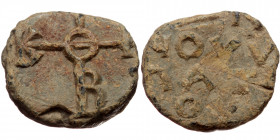 Byzantine seal (Lead, 20,3 mm, 8,74 g). Obv: Legend in four (?) lines. 
Rev: Cruciform monogram.