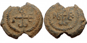 Byzantine seal (Lead, 25,3 mm, 9,57 g), ca. 7th cent. Obv: Cruciform monogram.
Rev: Cruciform monogram.