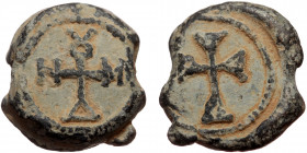 Byzantine seal (Lead, 16,9 mm, 8,57 g). Obv: Cross in a pellet border. 
Rev: Cruciform monogram.