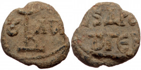 Byzantine seal (Lead, 18,6 mm, 5,44 g). Obv: Legend in two lines. 
Rev: Monogram, letters in fields.