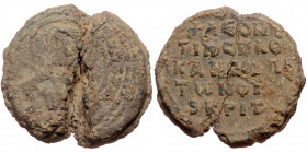 Byzantine seal (Lead, 24,0 mm, 11,15 g). Obv: Legend in five lines. 
Rev: Nimbate bust of uncertain saint facing, legend.