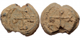 Byzantine seal (Lead, 25,8 mm, 13,68 g), ca. 7th cent. Obv: Cruciform monogram.
Rev: Cruciform monogram.
