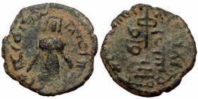 ISLAMIC, Umayyad Caliphate (Arab-Byzantine coinage).end of the C7th and beginning of the 8th century Æ Fals (Bronze, 21mm, 2.95g). 
Obv: Caliph stand...