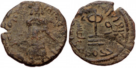 ISLAMIC, Umayyad Caliphate (Arab-Byzantine coinage).end of the C7th and beginning of the 8th century Æ Fals (Bronze, 20mm, 2.74g). 
Obv: Caliph stand...
