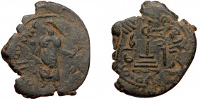 ISLAMIC, Umayyad Caliphate (Arab-Byzantine coinage).end of the C7th and beginning of the 8th century Æ Fals (Bronze, 23mm, 3.26g). 
Obv: Caliph stand...