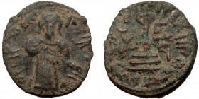 ISLAMIC, Umayyad Caliphate (Arab-Byzantine coinage).end of the C7th and beginning of the 8th century Æ Fals (Bronze, 19mm, 3.11g). 
Obv: Caliph stand...