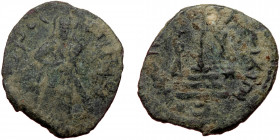ISLAMIC, Umayyad Caliphate (Arab-Byzantine coinage).end of the C7th and beginning of the 8th century Æ Fals (Bronze, 22mm, 3.08g). 
Obv: Caliph stand...