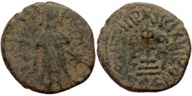 ISLAMIC, Umayyad Caliphate (Arab-Byzantine coinage).end of the C7th and beginning of the 8th century Æ Fals (Bronze, 18mm, 3.44g). 
Obv: Caliph stand...