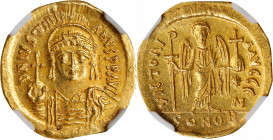 JUSTINIAN I, 527-565. AV Solidus (4.39 gms), Constantinople Mint, 7th Officina, 542-565. NGC MS, Strike: 5/5 Surface: 2/5. Clipped, Graffito.
S-140. ...