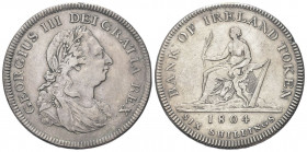 IRLANDA
Giorgio III, 1760-1820. 
Bank Dollar o 6 Schilling Token 1804, zecca di Birmingham.
Ag gr. 26,53
Dr. Busto laureato e drappeggiato a d.
R...