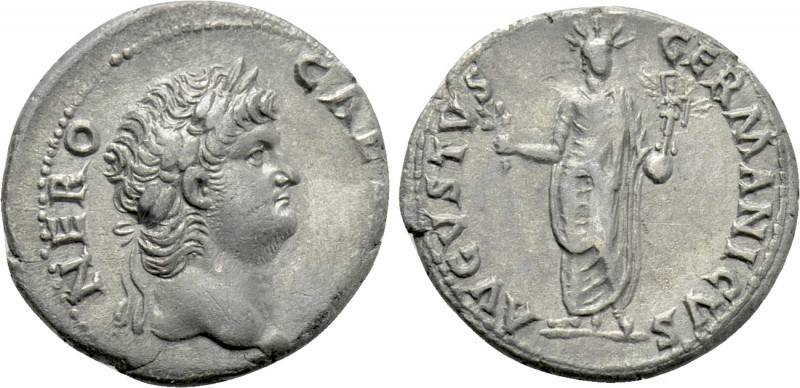 NERO (54-68). Denarius. Rome.

Obv: NERO CAESAR.
Laureate head right.
Rev: A...
