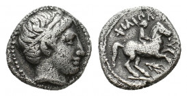 KINGS OF MACEDON. Philipp II. (359-336). AR, 1/5 Tetradrachm. Amphipolis.
Obv: Head of Apollo right, wearing taenia.
Rev: ΦIΛIΠΠ-OY. 
Horseman riding ...