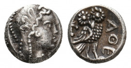 LEVANT OR ARABIA. Uncertain. (Circa 400-300 BC) AR Trihemiobol (?)
Obv: Helmeted head of Athena(?) or female(?) right.
Rev: AΘE.
Owl standing right, h...