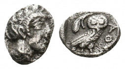 ATTICA. Athens (Circa 454-404 BC). AR Obol
Obv: Helmeted head of Athena right.
Rev: AΘE.
Owl standing right, head facing; olive sprig and crescent to ...