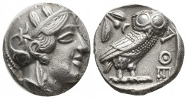 ATTICA. Athens (Circa 454-404 BC). AR Tetradrachm
Obv: Helmeted head of Athena right, with frontal eye.
Rev: AΘE.
Owl standing right, head facing; oli...