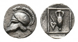 ASIA MINOR. Uncertain mint. (5th century BC). AR Tetartemorion 
Obv: Corinthian helmet left. 
Rev: Amphora and ivy leaf in linear square. 
Unpublished...