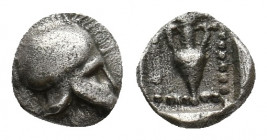 ASIA MINOR. Uncertain mint. (Circa 450 BC) AR Tetartemorion. 
Obv: Crested Corinthian helmet right. 
Rev: Amphora within dotted square within incuse s...