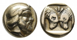 LESBOS. Mytilene. (Circa 454-427 BC). EL Hekte.
Obv: Diademed head of Silenos right.
Rev: Two confronted ram's heads, palmette between; all within inc...