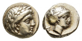 LESBOS. Mytilene. (Circa 377-326 BC). EL Hekte.
Obv: Laureate head of Apollo right.
Rev: Head of Artemis right, with hair in sphendone; coiled serpent...