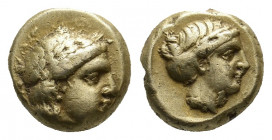 LESBOS. Mytilene. (Circa 377-326 BC). EL Hekte.
Obv: Laureate head of Apollo right; to left, serpent coiled right.
Rev: Head of Artemis right, with ha...