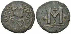 JUSTIN I (518-527 AD). AE, Follis. Constantinople. 2nd officina.
Obv: [D] N IVSTINVS P AV[G]. 
Diademed, draped and cuirassed bust right.
Rev: Large M...