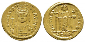 MAURICE TIBERIUS (582-602 AD). AV, Solidus. Constantinople.
Obv: D N mAVRIC TIbЄR PP AV. 
Helmeted, draped and cuirassed bust facing, holding globus c...