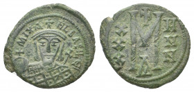MICHAEL I RHANGABE (811-813 AD). AE, Follis. Constantinople.
Obv: MIXAHL ЬASILЄ. 
Facing bust of Michael, wearing crown with cross on circlet and loro...