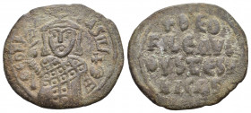 THEOPHILUS (829-842 AD). AE, Follis. Constantinople.
Obv: ΘЄOFIL ЬASILЄ. 
Facing bust, holding labarum and globus cruciger, and wearing crown surmount...