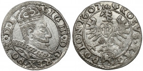 Zygmunt III Waza, Grosz Kraków 1607 Praktycznie menniczy, ale z ryską przed portretem. Odmiana z małym popiersiem króla, herbem Lewart w tarczy. Waria...